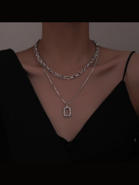 “Élégance et Style: Découvrez le Collier Double Couche en Acier Inoxydable Titane – Vivian”